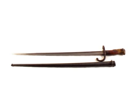 A French model 1874 Gras bayonet with matching numbered scabbard, the fine condition blade dated 1882 and very good scabbard 