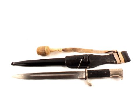 A Third Reich era dress bayonet with scabbard, leather frog and knot