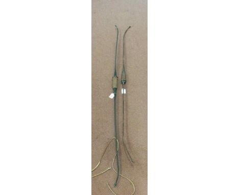 Two vintage steel bows by Accles & Pollock Ltd including an 'Apollo' with a quantity of arrow heads