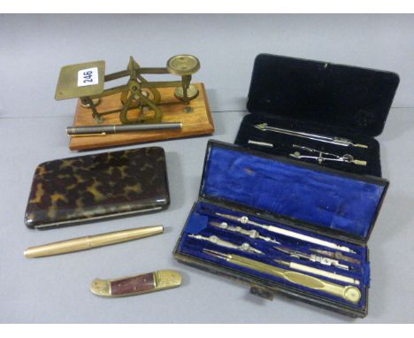 Box of Mixed Collectables including Scales, Pen, Tortoiseshell Effect Case, Cased Drawing Instruments, etc