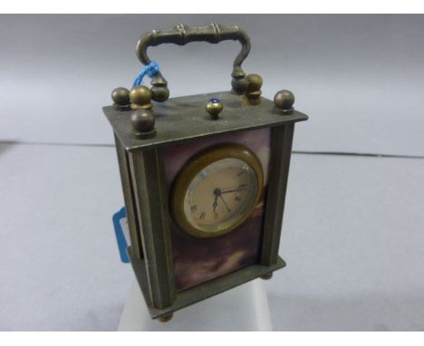 Brass Cased Carriage Clock with decorative panels