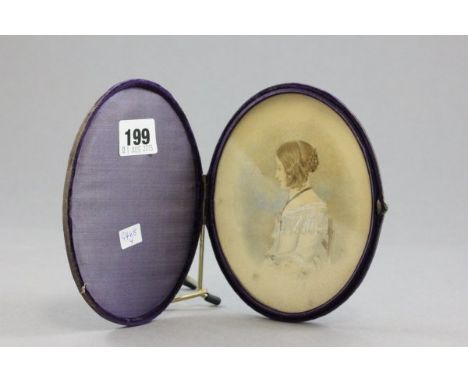 19th century Small Portrait of a Young Lady contained in an Oval Folding Travelling Case