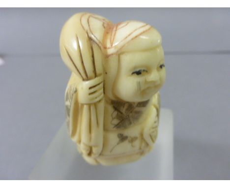 Signed Oxbone Netsuke of a Lady with Sack & Fan