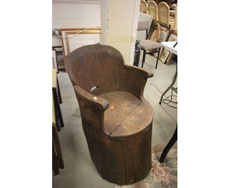 Barrel Type Chair partly formed from the outer layer of a Tree Trunk