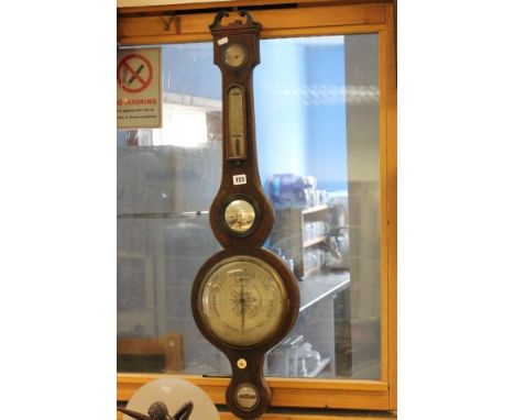 19th century Mahogany Cased Wheel Barometer with Thermometer made by J Pini, 13 Baldwins Garden, Holbourne, London