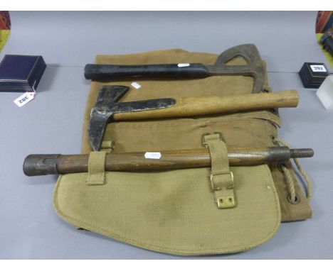 Two Military Fire Axes, an Entrenching Tool and a Canvas Kit Bag