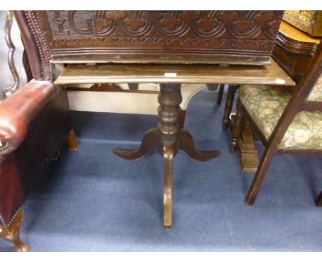 A RECTANGULAR OAK TRIPOD TABLE