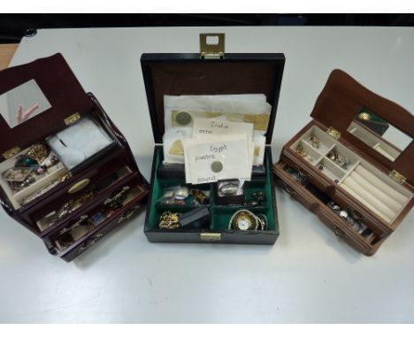THREE JEWELLERY BOXES, containing three ladies wristwatches, 9ct gents ring, costume jewellery and coins