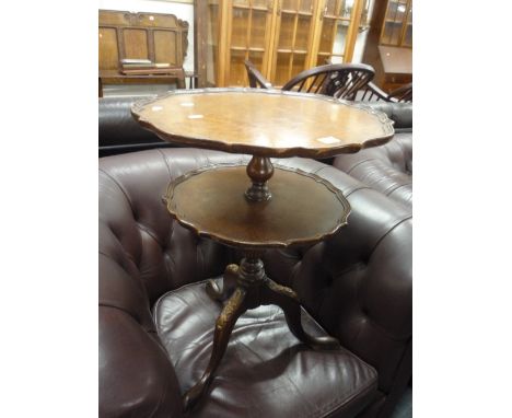 A WALNUT TWO TIER BUFFET/OCCASIONAL TABLE, on tripod support