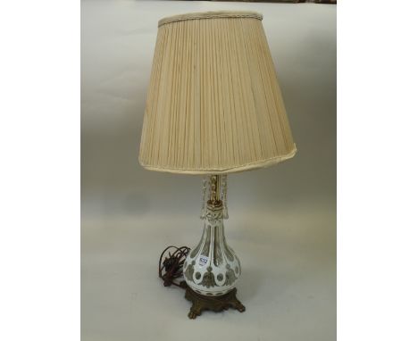 A BOHEMIAN OVERLAY GLASS TABLE LAMP, of pear form, over laid in white and etched with flowers and lozenges