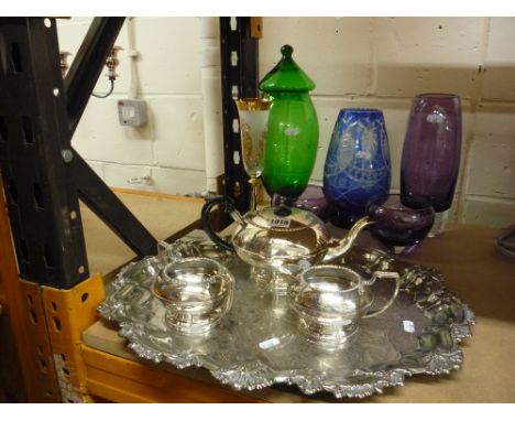 A SILVER PLATED THREE PIECE TEA SERVICE, on tray together with glass vases etc