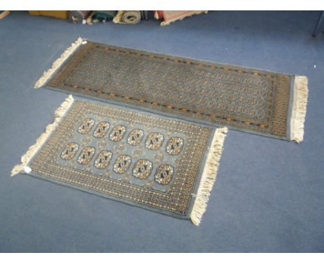 A BLUE GROUND CARPET RUNNER, approximate size 175cm x 63cm and a similar small rug approximate size 98cm x 63cm (2)