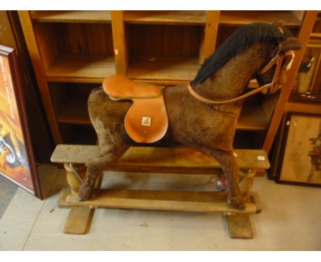 A CHILDS MAMAS AND PAPAS ROCKING HORSE, (s.d.)