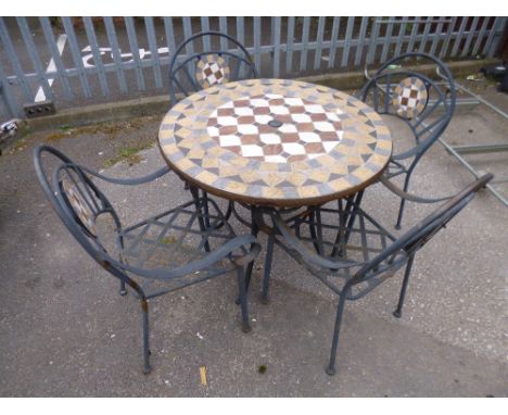 A METAL TILE TOPPED GARDEN TABLE, and four chairs (5)