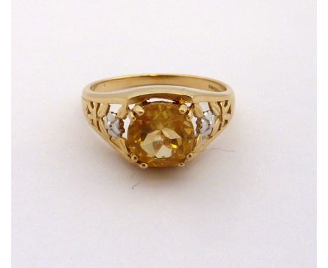 A 9CT GOLD CITRINE DRESS RING, with circular shape citrine to the floral bi coloured tapered shank, hallmarks for Birmingham