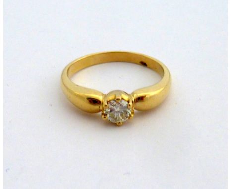 A SINGLE STONE DIAMOND RING, the brilliant cut diamond to the plain tapered shank, estimated weight 0.25cts, stamped 750, rin