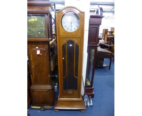 AN ART DECO STYLE WALNUT LONGCASE CLOCK, with chrome pendulum and triple weights