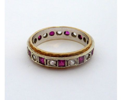 A 9CT GOLD RUBY AND DIAMOND BAND RING, with square shape rubies with single cut diamonds to the bi-coloured band, hallmarks f