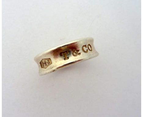 A TIFFANY AND CO RING, a silver 1837 Tiffany and Co ring dated 1997, ring size O