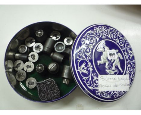 A TIN OF CAST METAL BUTTON MOULDS, and similar items