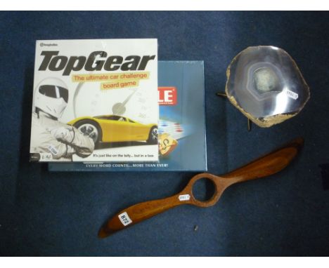 A SMALL WOODEN PROPELLOR, two boxed games and a novelty crystal item (4)