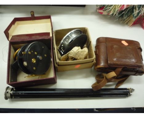 TWO BOXED FISHING REELS, 'Easicast' and 'Eureka', together with Ensign camera and a tripod (4)