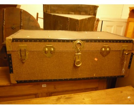 A LARGE TRAVELLING TRUNK