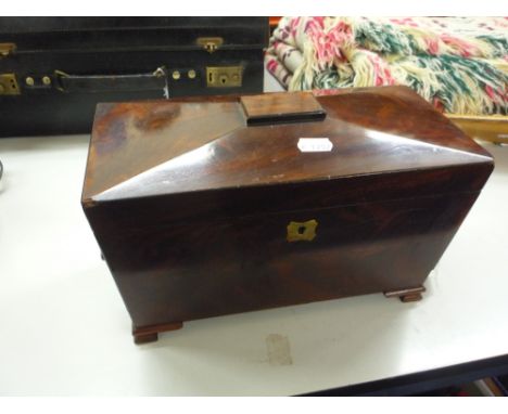 A 19TH CENTURY MAHOGANY TEA CADDY, of sarcophagus form, fitted interior, lacking mixing bowl
