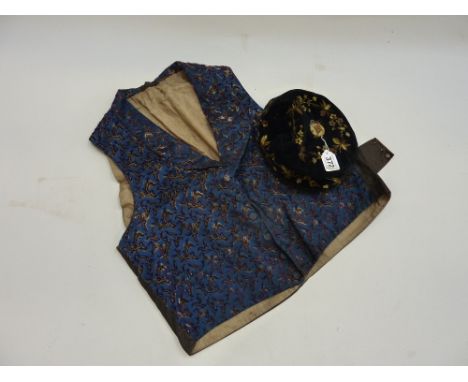 A VINTAGE EMBROIDERED WAISTCOAT, and cap