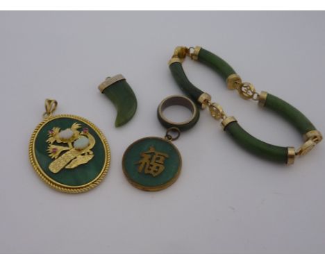 A COLLECTION OF NEPHRITE JADE JEWELLERY, to include a bracelet, three pendants and one ring