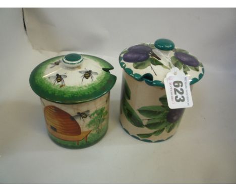 A WEMYSS PRESERVE POT, painted with plums, impressed and painted marks and another honey pot, painted with Bees and Hive (cra