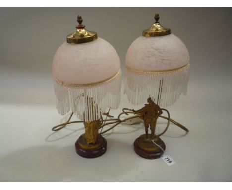 A PAIR OF GILT METAL FIGORAL LAMP BASES, with glass and bead shades (s.d.) (2)