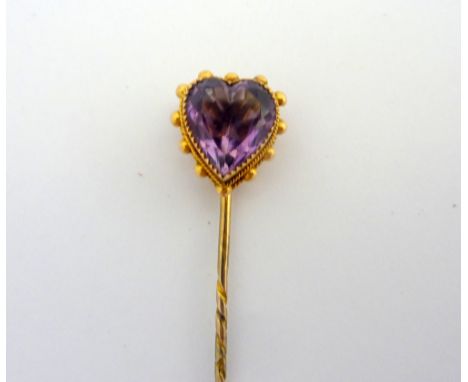 A VICTORIAN AMETHYST HEART SHAPE STICK PIN