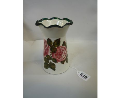 A WEMYSS VASE, painted roses and green leaves, with T. Goode & Co, South Audley Street, London on base, impressed mark, heigh