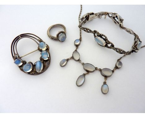 A COLLECTION OF JEWELLERY, to include a moonstone necklace, brooch, bracelet and ring together with a Marcasite band ring, ri