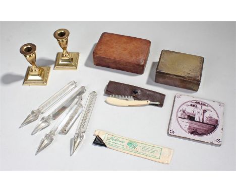 Mixed lot, to include a Delft tile, a pair of brass candlesticks, a leather box, etc, (qty)