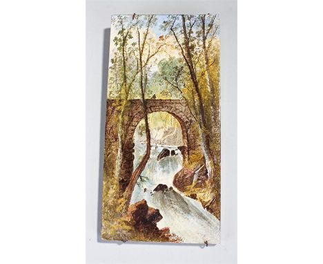 Rectangular tile showing a river scene with a bridge signed W Yale 