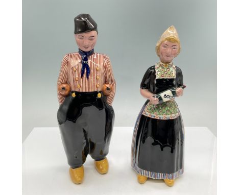 A delightful pair of hand-painted ceramic character decanters, made in Holland. The set features a man and a woman in traditi