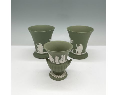 A collection of three Wedgwood Jasperware vases in sage green with classical white bas-relief decorations. This lot includes 