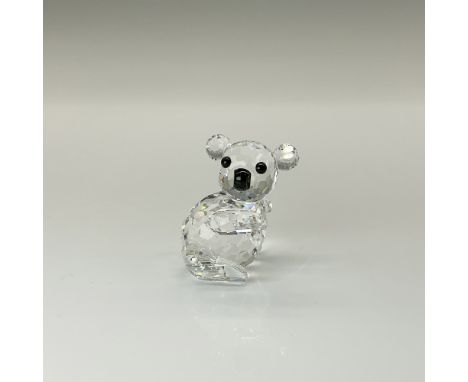 Part of the Endangered Species Collection. Clear, faceted right facing body with black eyes and nose. Swarovski backstamp. 76