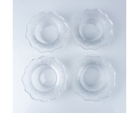 This charming set includes four vintage frosted glass bowls, each featuring a delicate leaf motif around the rim. The bowls a