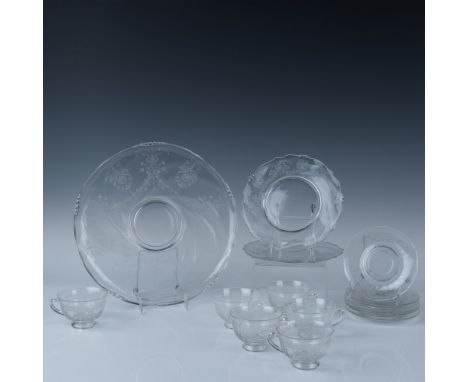 Gorgeous group of clear glass in the June pattern, decorated with an intricate etched botanical design. Includes: 6 Teacups w