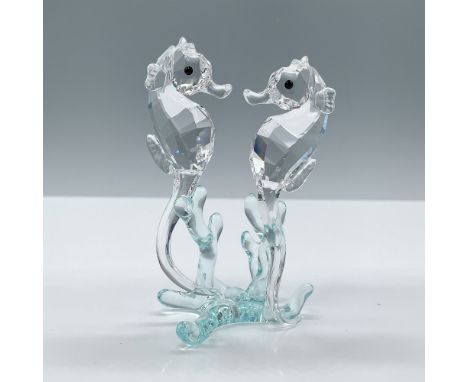 Brilliant clear crystal figure of seahorses on a base of light turquoise crystal. Swarovski etched mark. This item has its or