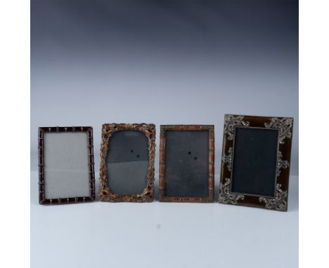 This elegant 4-piece picture frame set features intricate craftsmanship with bamboo-inspired designs and floral accents. Each