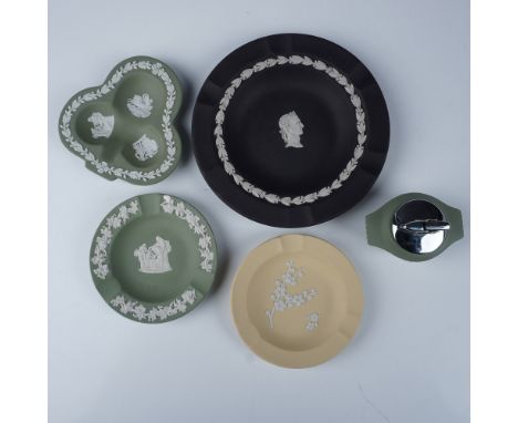 This lot features five pieces of Wedgwood Jasperware, each showcasing the brands signature neoclassical relief design. The it