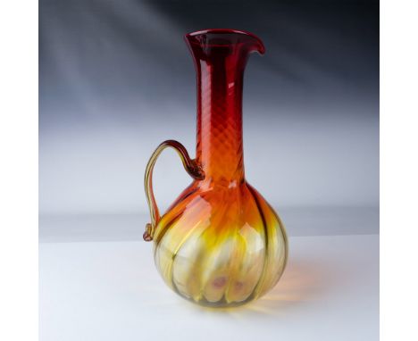 This 1972, Blenko optic swirl monumental pitcher, 7033,  was done by Joel Myers and showcases the artistry of mid-century Ame