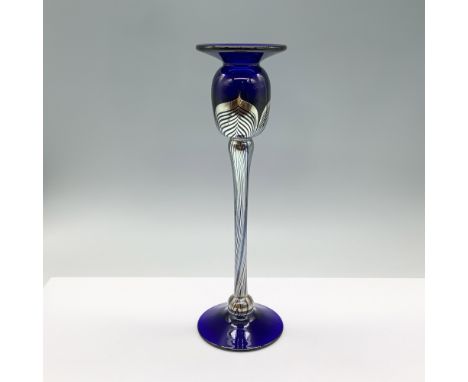 This striking Art Deco-style candleholder is by renowned artist Steven Correia. Crafted from cobalt blue glass, it features a