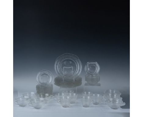 A lovely vintage set in the classic pressed glass style. This collection includes seven soup bowls, six small bowls, seven cu