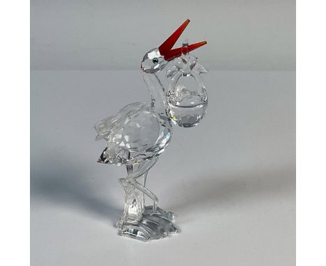 This sweet crystal stork with baby in a basket is part of the Cheerful Times grouping. The stork's body and the basket are ma