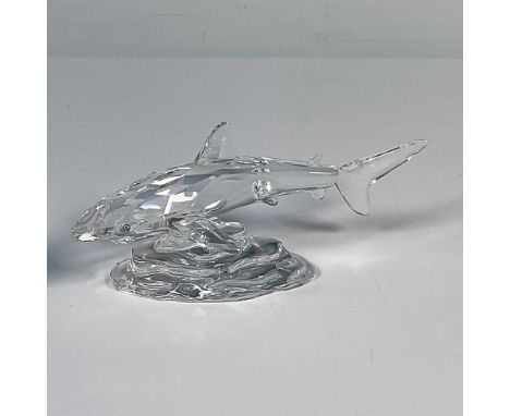 This baby shark was part of the South Sea grouping. The clear faceted crystal shark is skirting the bottom of the ocean, repr